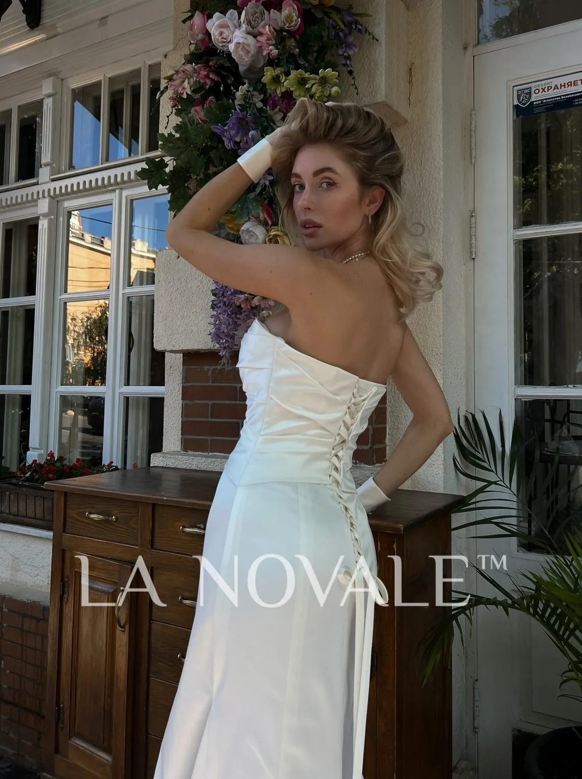 lace up bandeau strapless bridal gown in satin